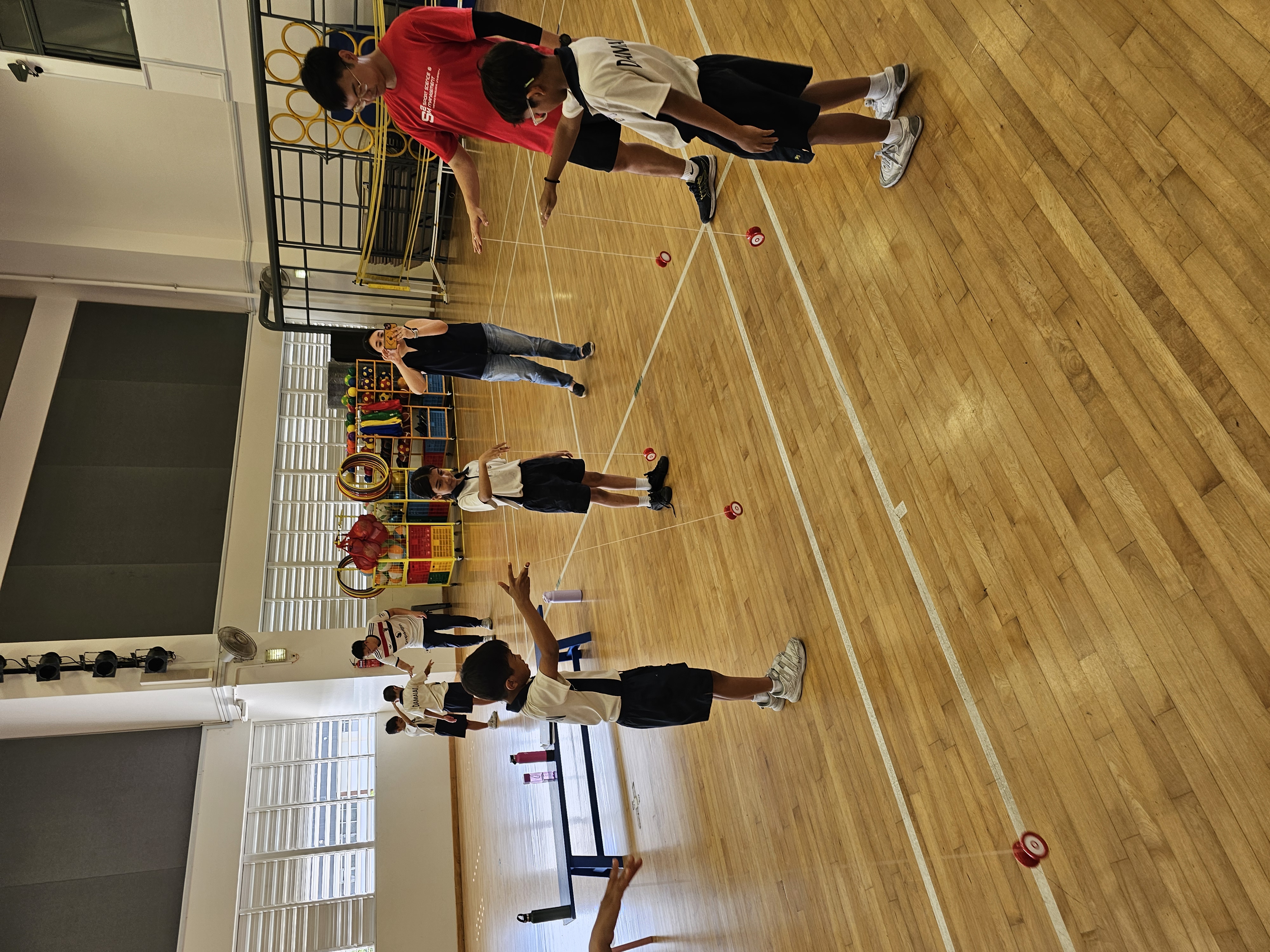 Children practicing yoyo after school